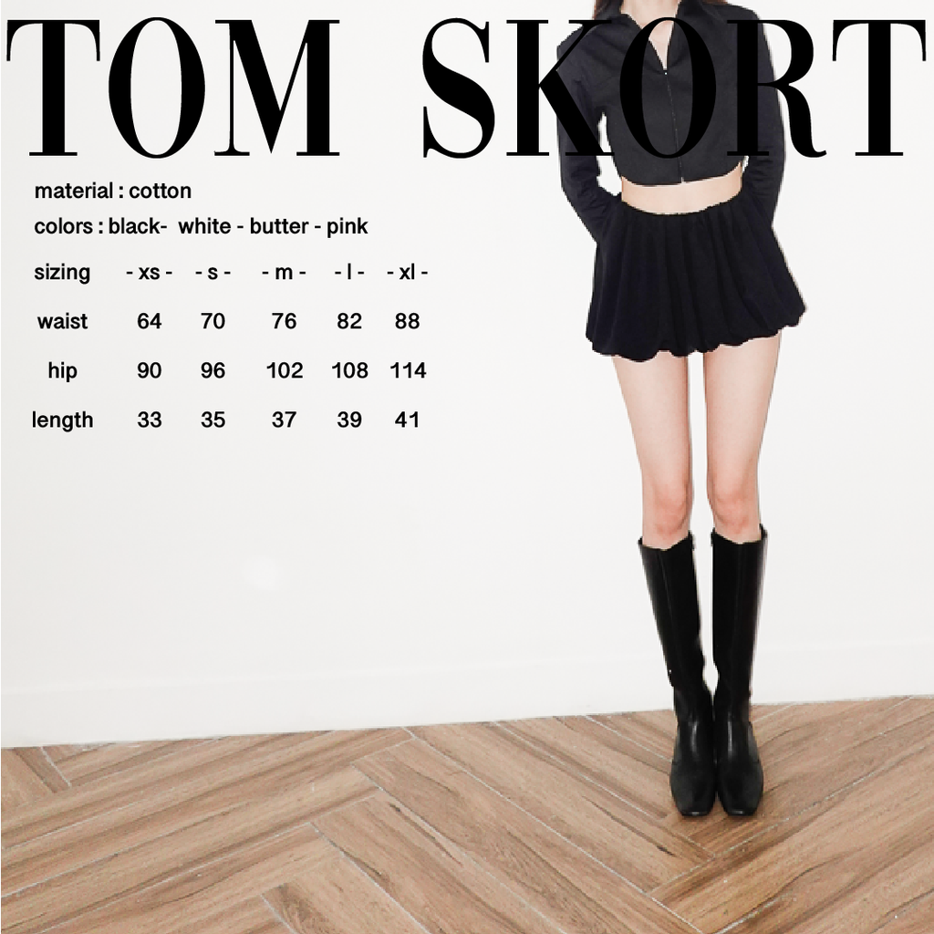 TOM SKORT